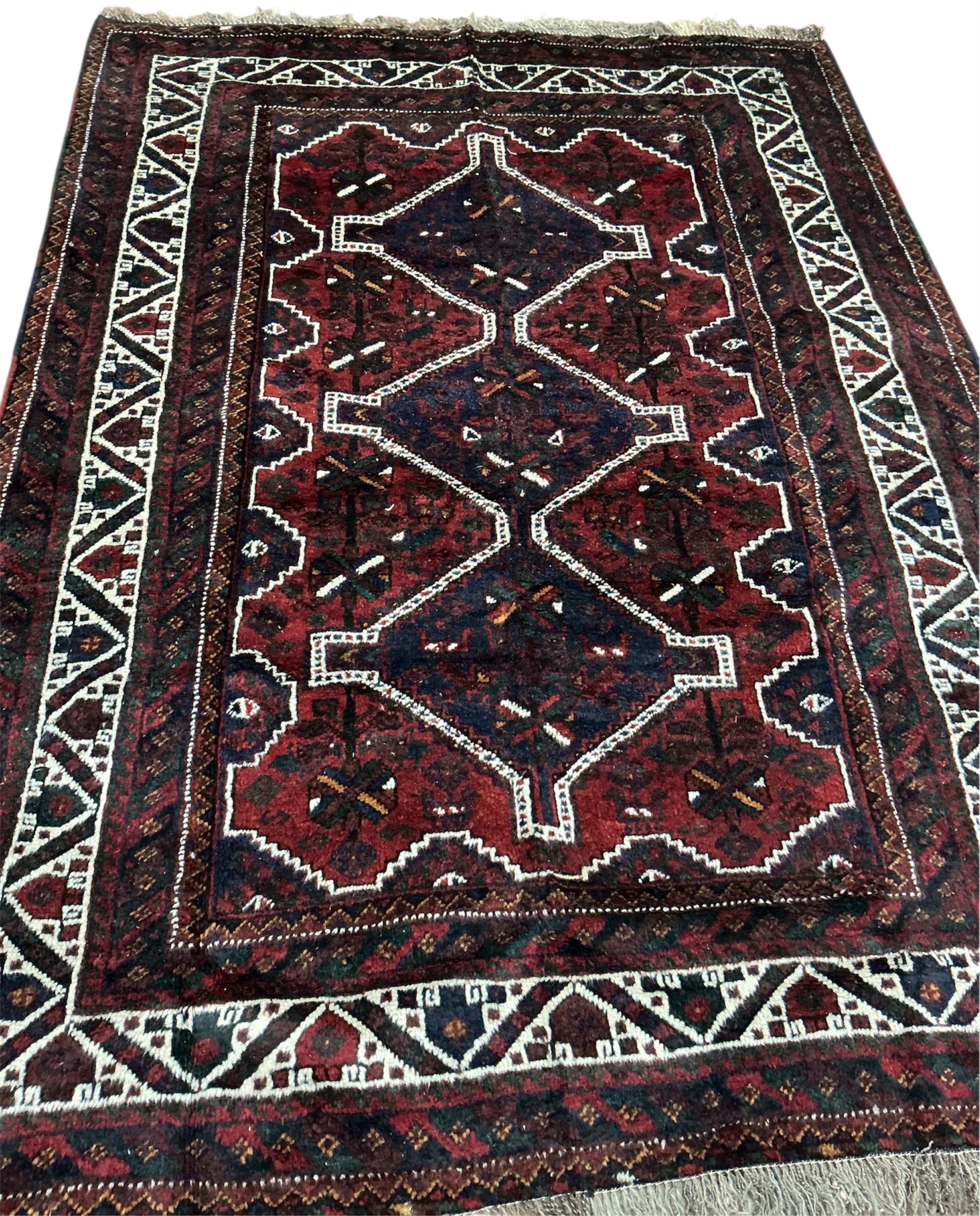 A Hamadan blue ground rug, 220cm x 160cm.